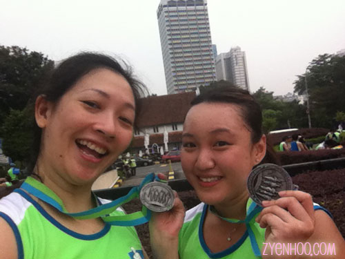 Audrey and I with our finisher medals. We iz awesome like dat!