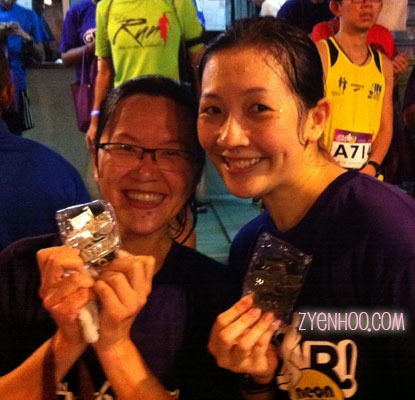 Luan and I with our medals which we hadn't opened from the wrappers yet!