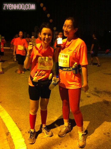 Ika and I with our medals. Note that I'm wearing pink pants to challenge Ika's pink calf sleeves, hehehe.