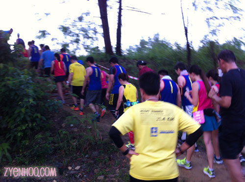 Going upslope at the off-road section. I could hear a lot of grumbling as the runners trekked the small slope up.