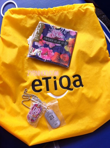 The finisher bag for half-marathoners. Includes the finisher tags and a finisher head buff
