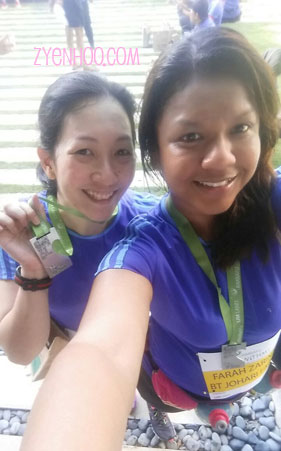 Farah and I with our finisher medals. Yay!