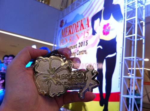 The medal for the Merdeka Fun Run! (You can just about make out the tiny inscription of 10km Finisher at the bottom)