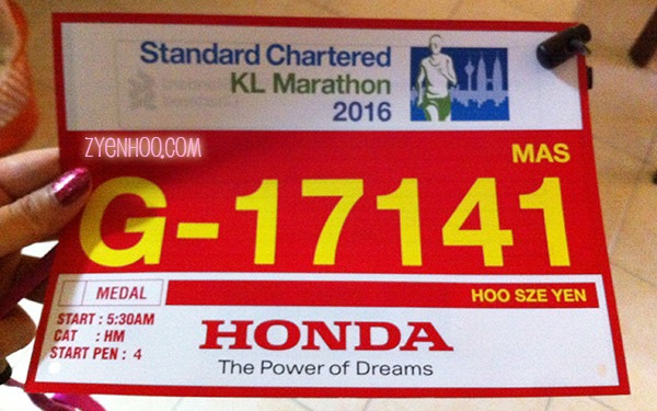 My bib for the half-marathon! But they forgot to punch a hole in the top left corner.